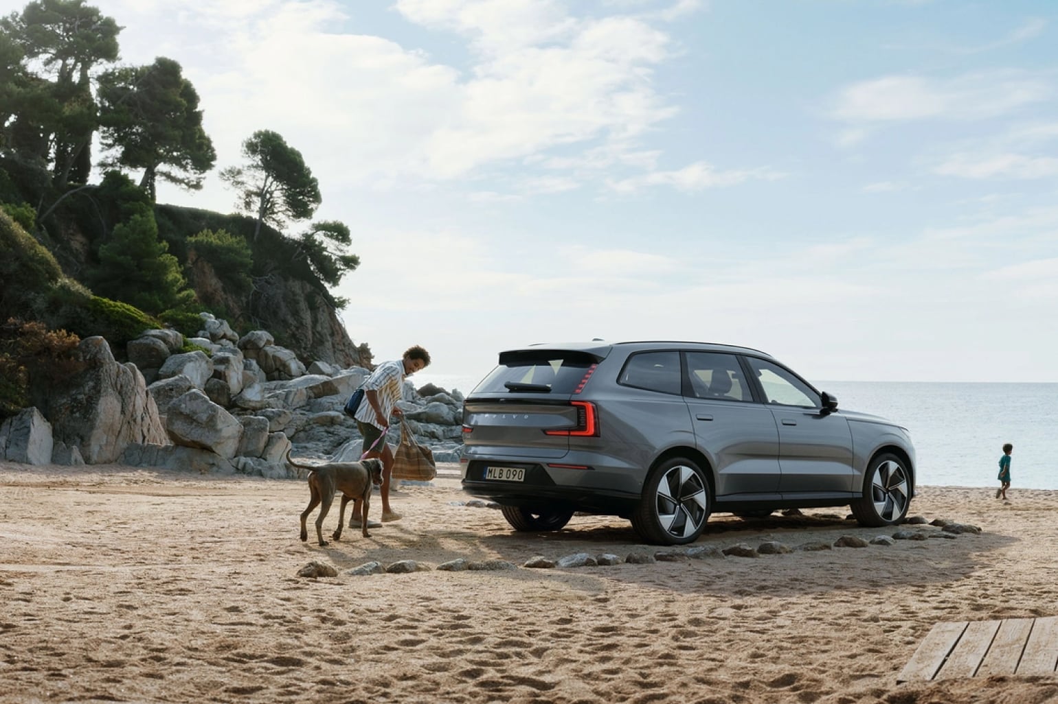 Volvo SUV parked on a beach