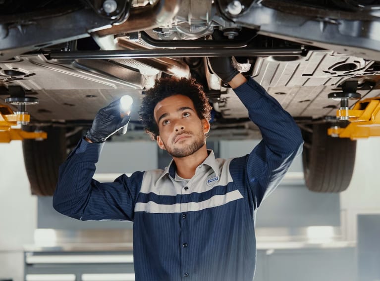 Volvo technician servicing a vehicle